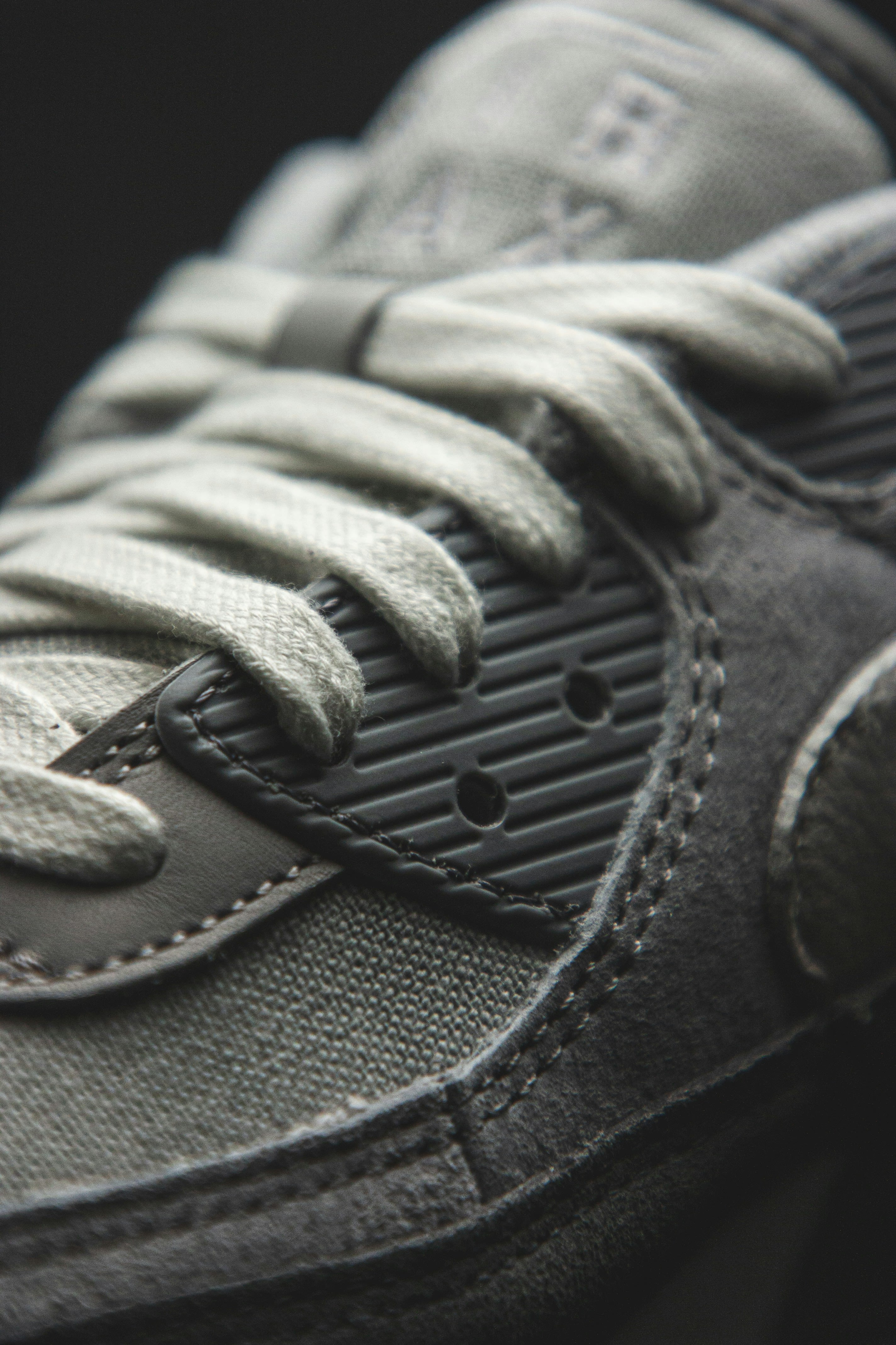 white and black nike athletic shoe